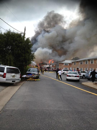 Illustration for article titled F-18 Crashes into Apartment Building and Explodes (Update: No Deaths)